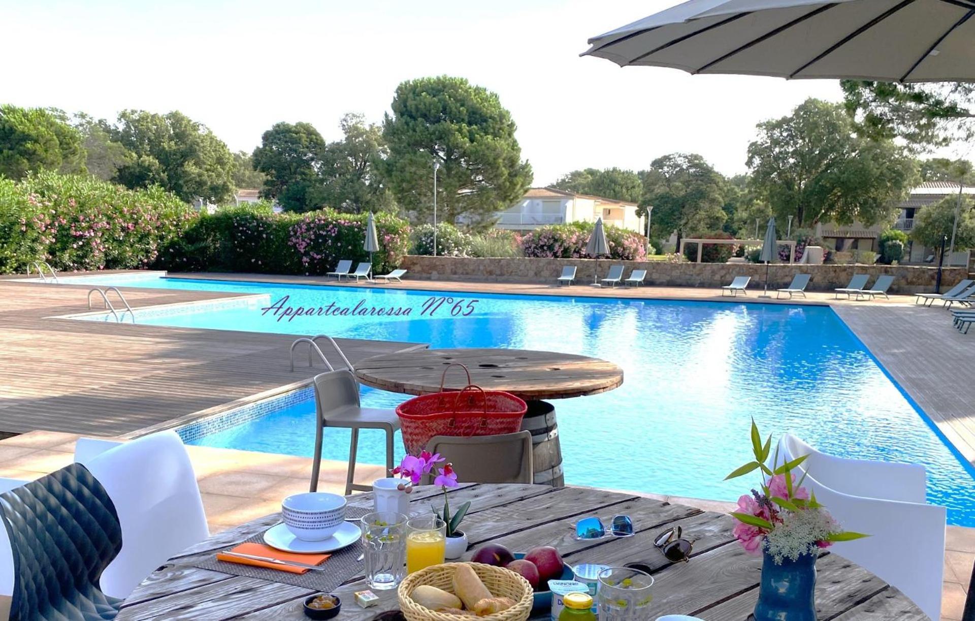 Fiori Di Cala Rossa Residence Hoteliere Lecci Bagian luar foto